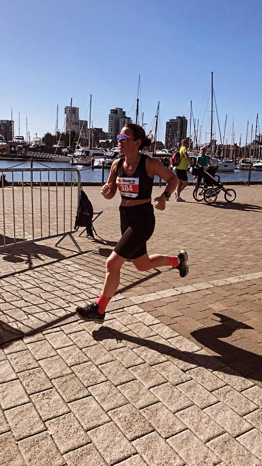 Image of Laura running in an event on the Ipswich waterfront